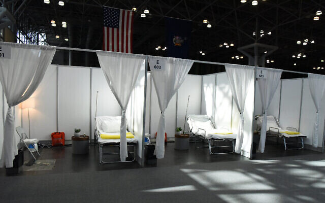 Patient care units, assembled by New York Army National Guard members and civilian staff, at the Jacob K. Javits Convention Center in New York City, March 27, 2020. (U.S. Air National Guard photo by Senior Airman Sean Madden)