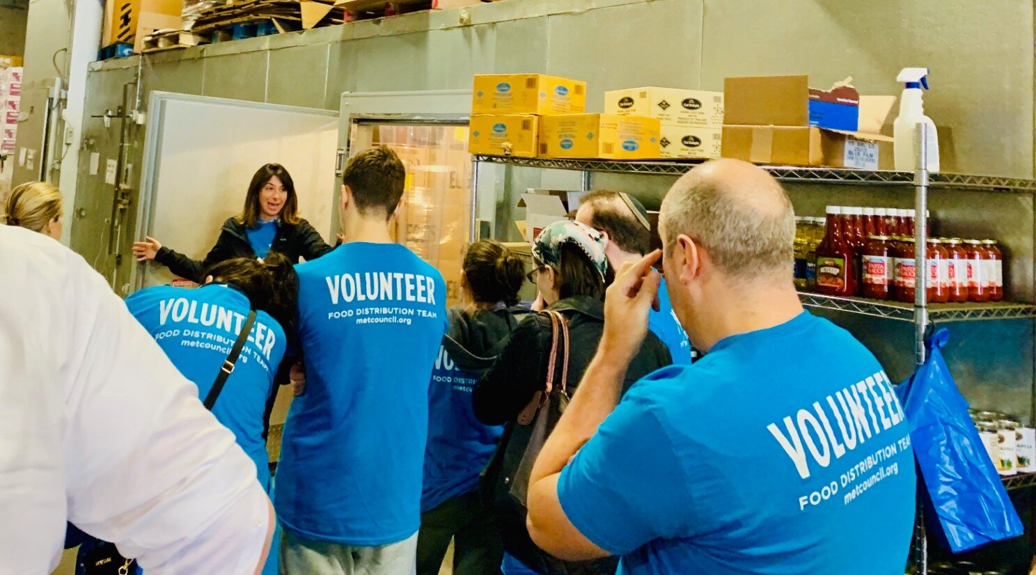 Volunteers at a food distribution center in New York run by the Met Council on Jewish Poverty. (Courtesy of Met Council)