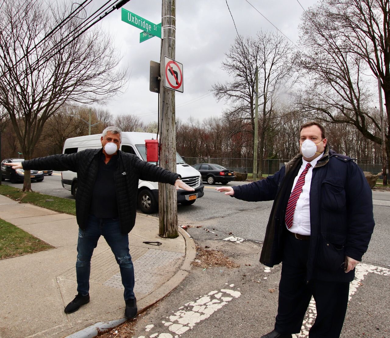 Scott Maurer, CEO &amp; executive vice-president, COJO; and Mendy Mirocznik, president, COJO practicing social distancing at the annual Passover Food Drive. (Courtesy/Mendy Mirocznik)